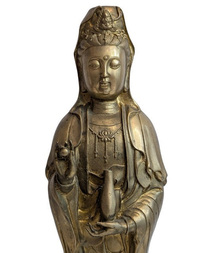 Casting interior visible beneath the Guanyin base