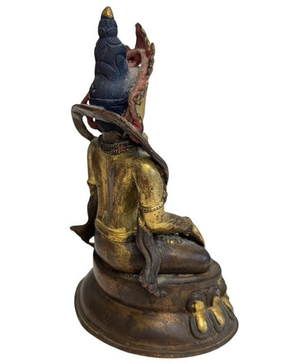 Fire-gilt bronze Green Tara seated on a lotus base