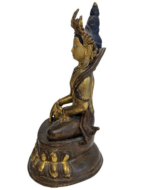 Fire-gilt Tara figure with ornate jewellery
