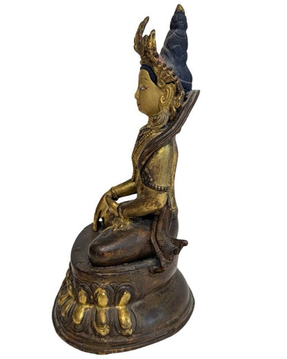 Fire-gilt Tara figure with ornate jewellery