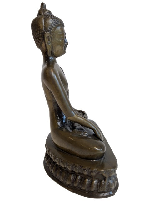 Seated bronze Buddha with both hands resting in the lap
