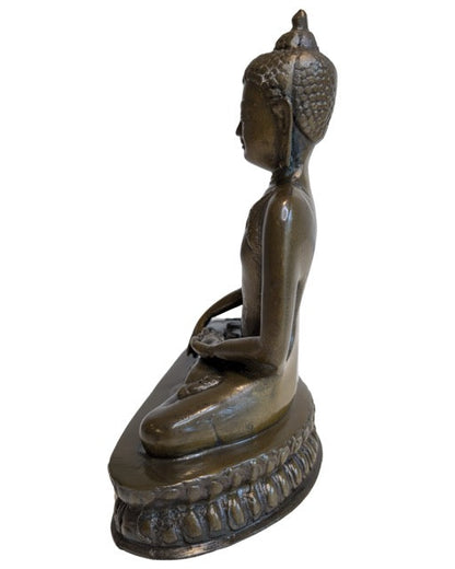 Seated Buddha on a detailed lotus pedestal