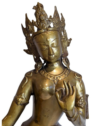 Aged gilded surface and patina of the Tara figure