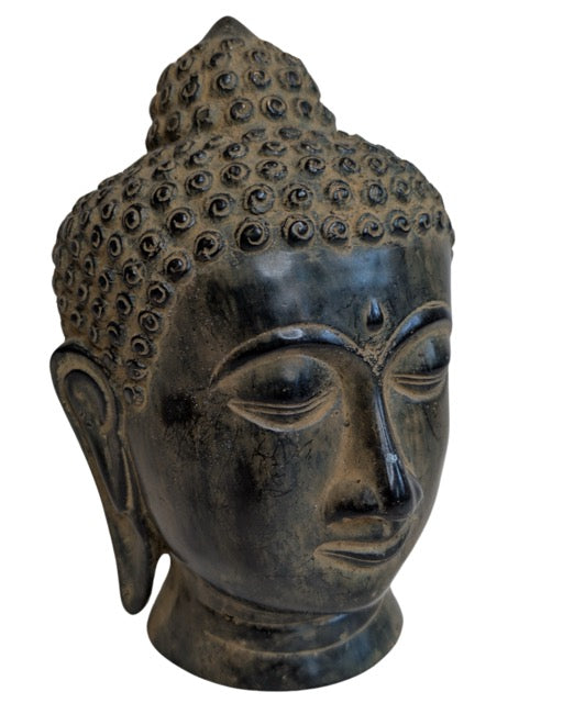Freestanding bronze Buddha head with tightly curled hair