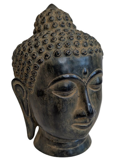 Freestanding bronze Buddha head with tightly curled hair