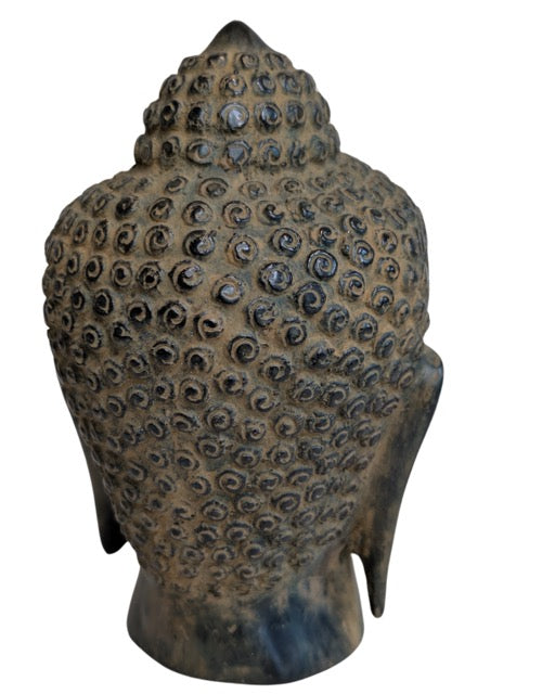 Back of the freestanding bronze Buddha head and hair curls