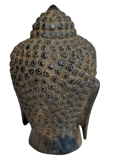 Back of the freestanding bronze Buddha head and hair curls