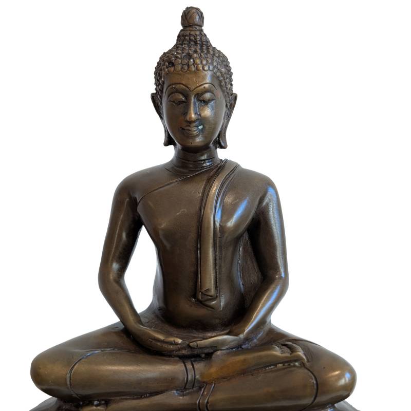 Close front view of Thai bronze Buddha with hands resting in Dhyana Mudra