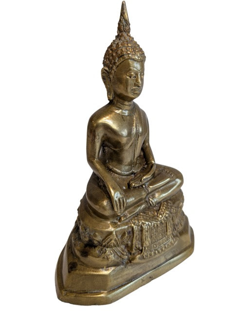 Naturally worn gilded surface of the Thai bronze Buddha