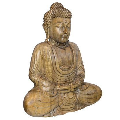 Thai wooden Buddha seated with both hands resting in the lap