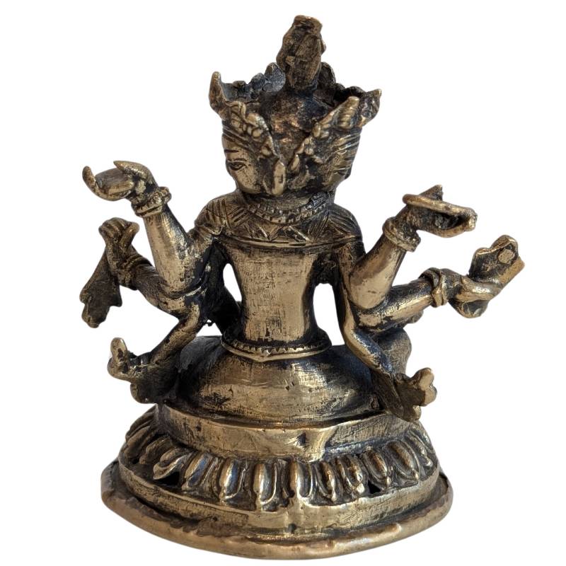 Three-faced, eight-armed bronze Ushnishavijaya on a lotus base, rear view