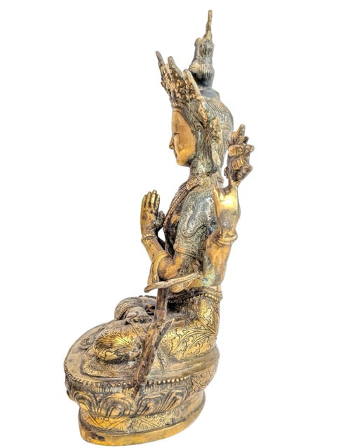 Chenrezig seated in meditation on a double lotus pedestal