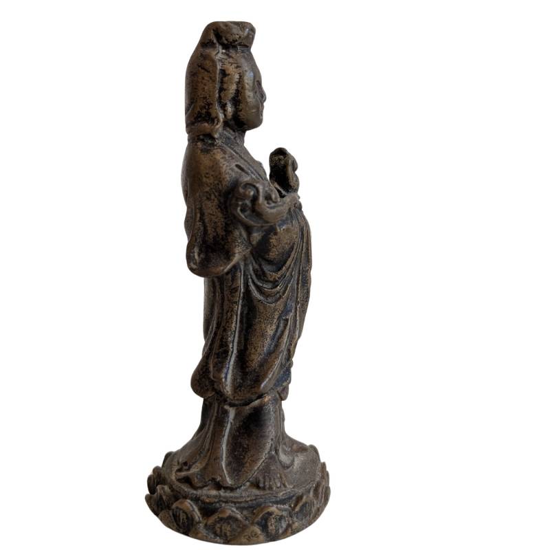 Right profile of the small Chinese bronze Guanyin on a lotus pedestal
