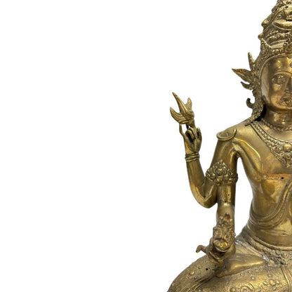 Detail of the left-side arms holding a lotus bud and ritual vessel