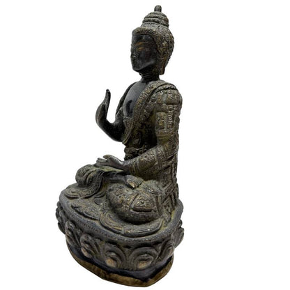 Opposite front angle of Abhaya Mudra Buddha on lotus base