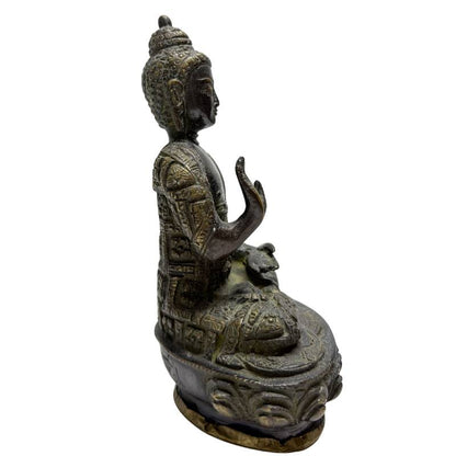 Side angle of Abhaya Mudra Buddha with engraved panel robe
