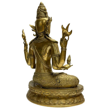 Rear-right view showing the four arms and lotus base of the bronze bodhisattva