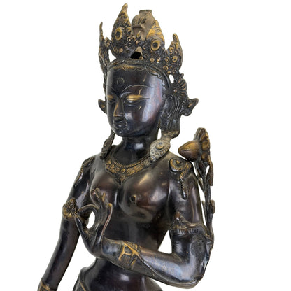 Face and upper-body detail of the antique Nepalese Green Tara with crown and historic gilding