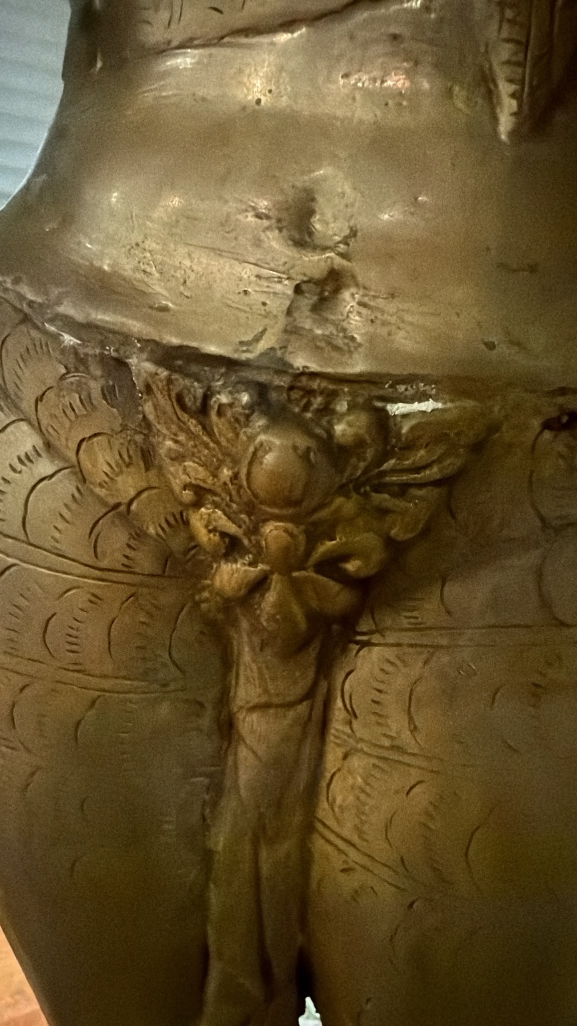 Hand-punched mark and engraved detail on the antique Nepalese Green Tara