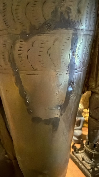 Old repair on the leg of the antique Nepalese Green Tara with naturally aged patina