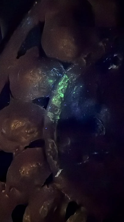 Ultraviolet surface study of the antique Nepalese Green Tara showing historic surface variation