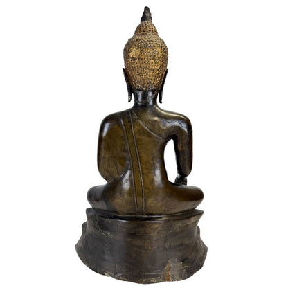 Rear view of Northern Thai bronze Buddha showing robe lines and pedestal