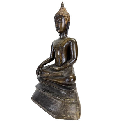 Three-quarter front view highlighting the Buddha’s serene face, earth-touching gesture and layered pedestal