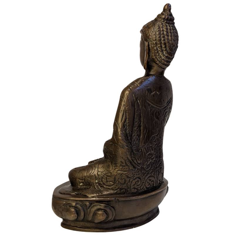 Rear-left view of seated bronze Buddha showing decorated robe and lotus base