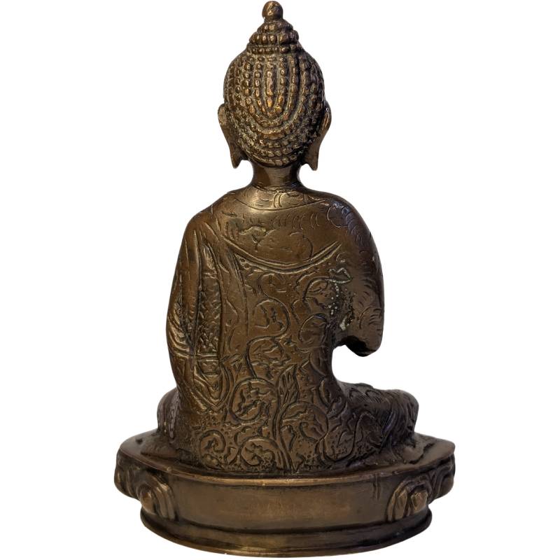 Rear view of seated bronze Buddha showing decorated robe and lotus base