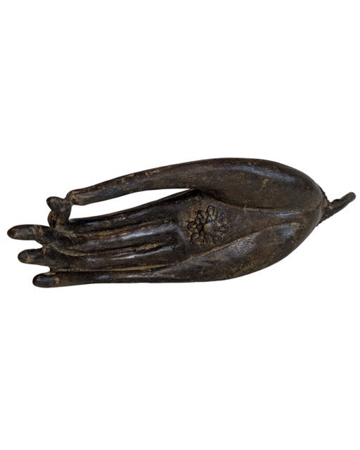 Thai-style bronze teaching hand with naturally aged dark patina