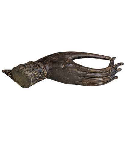 Old Southeast Asian bronze Buddha hand on a custom display stand