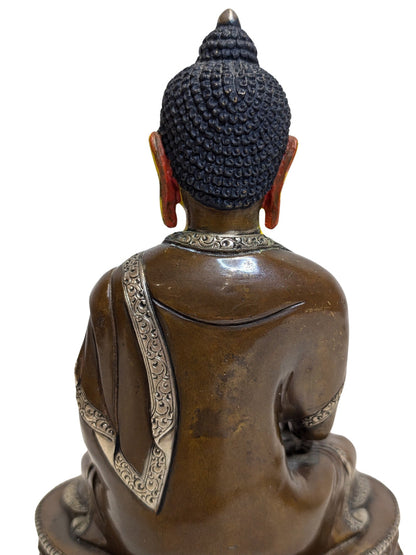 Well-defined robes on the Tibetan bronze figure