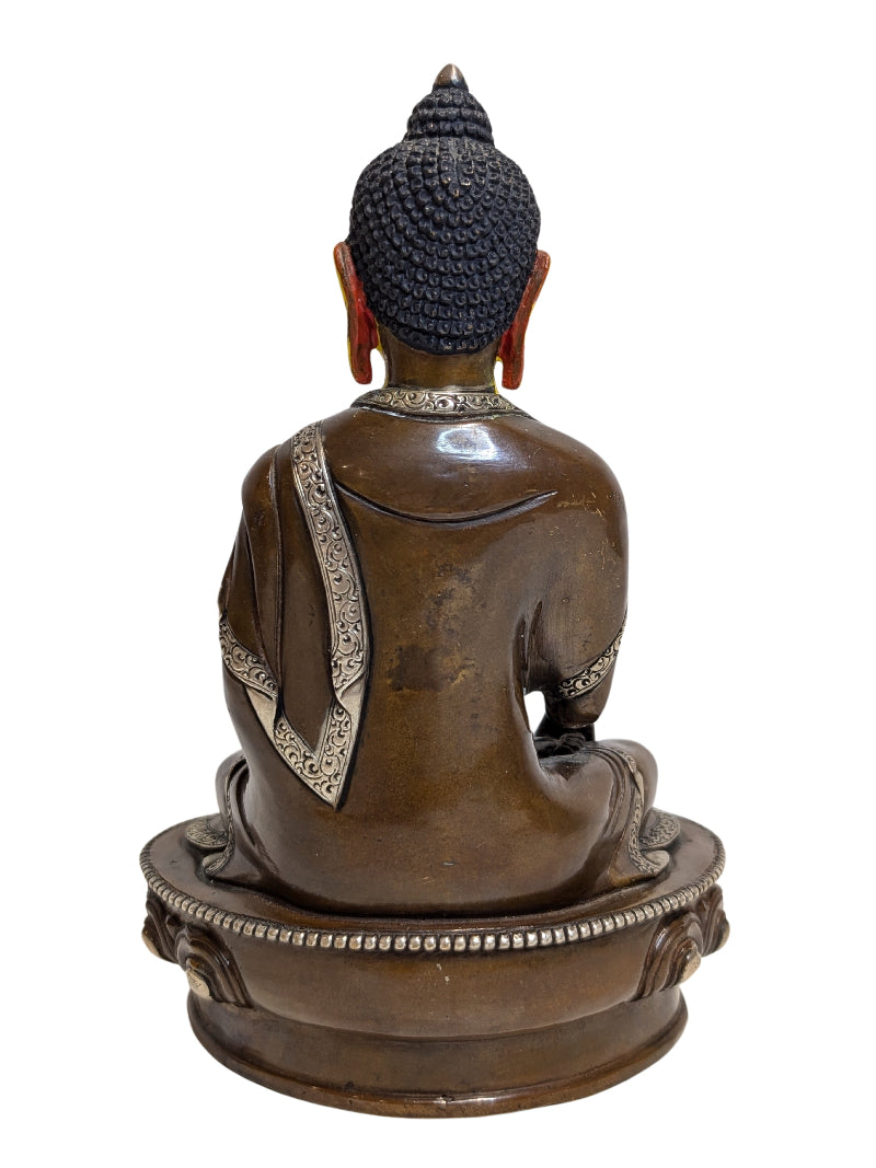 Lotus base beneath the seated Medicine Buddha