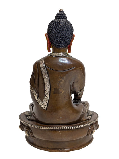 Lotus base beneath the seated Medicine Buddha