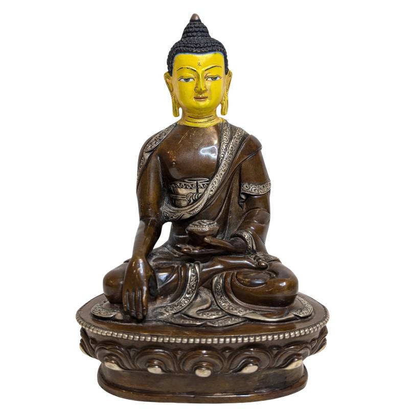 Serene face and flame-like ushnisha of the Tibetan Medicine Buddha
