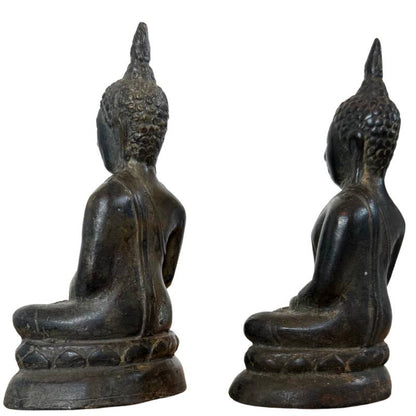 Opposite rear three-quarter view of pair of antique Thai bronze Buddhas