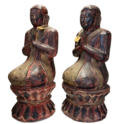Front view of pair of antique Thai Thapanom figures with joined hands
