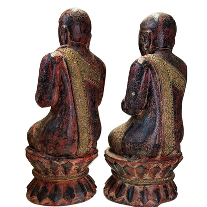 Rear three-quarter view of pair of antique Thai Thapanom figures