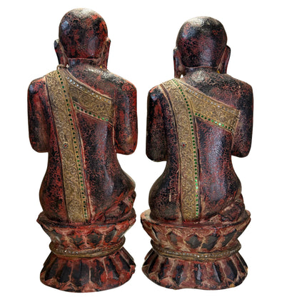 Rear view of pair of antique Thai Thapanom figures showing decorated robes