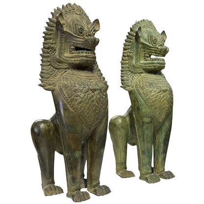 Front-right view of pair of bronze Singha temple lions