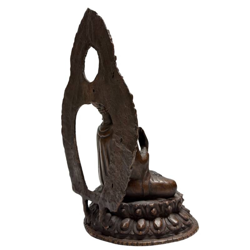 Rear view of both Himalayan bronze Buddhas and their openwork aureoles