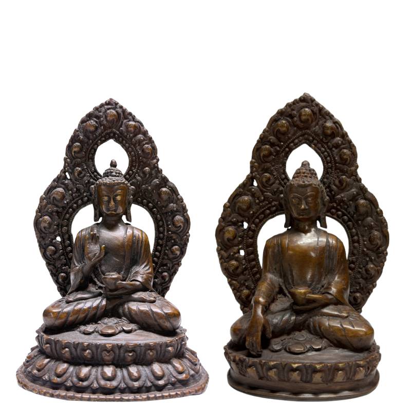 Pair of late 19th-century Himalayan bronze Buddhas with openwork aureoles, front view