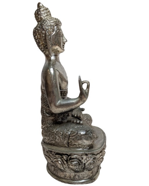 Seated Nepalese Buddha with detailed engraved robe