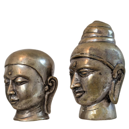 Set of Two Buddhist Heads – Buddha & Monk, Bronze – right-side view