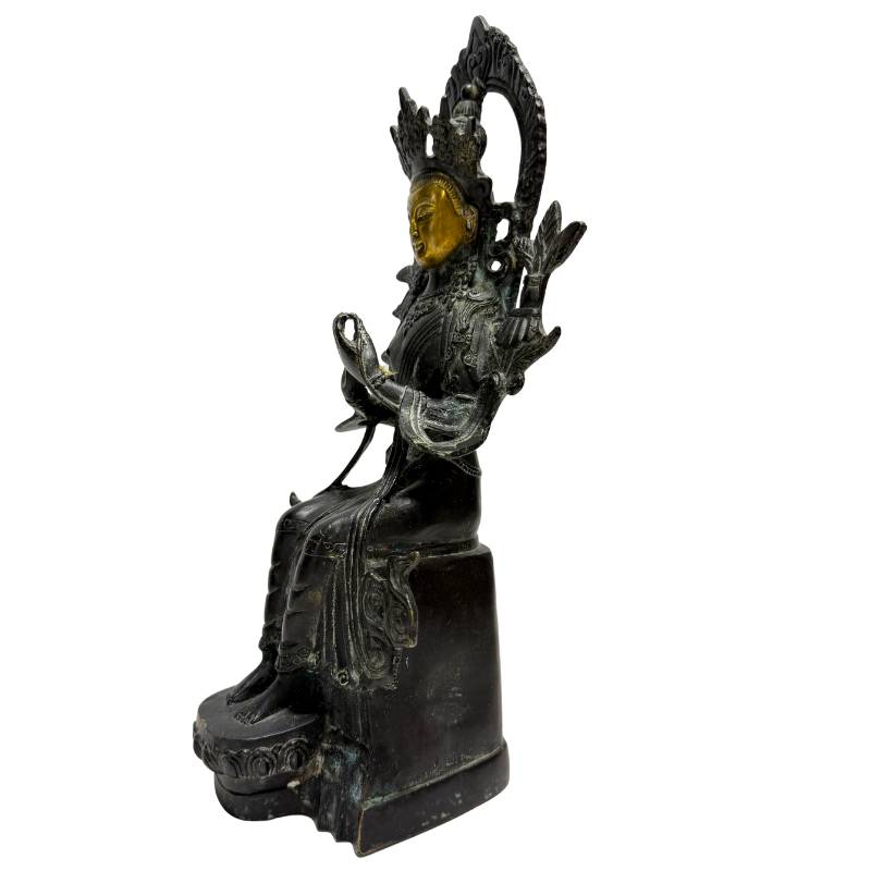 Left-front view of the bronze Maitreya with hands joined in Anjali Mudra