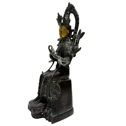 Left-front view of the bronze Maitreya with hands joined in Anjali Mudra