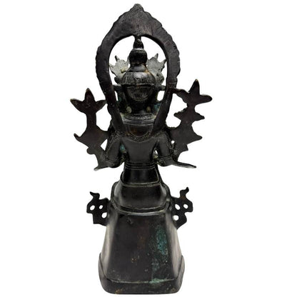 Rear view of the Sino-Tibetan bronze Maitreya with pierced halo and pedestal