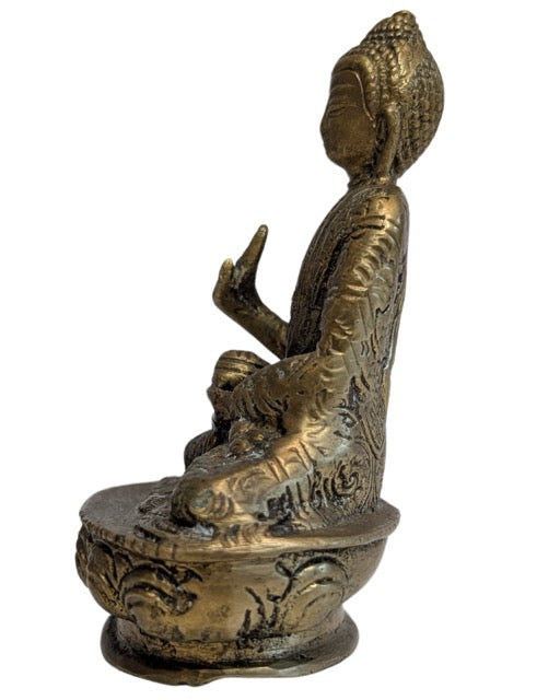 Underside of the small Nepalese bronze Buddha base