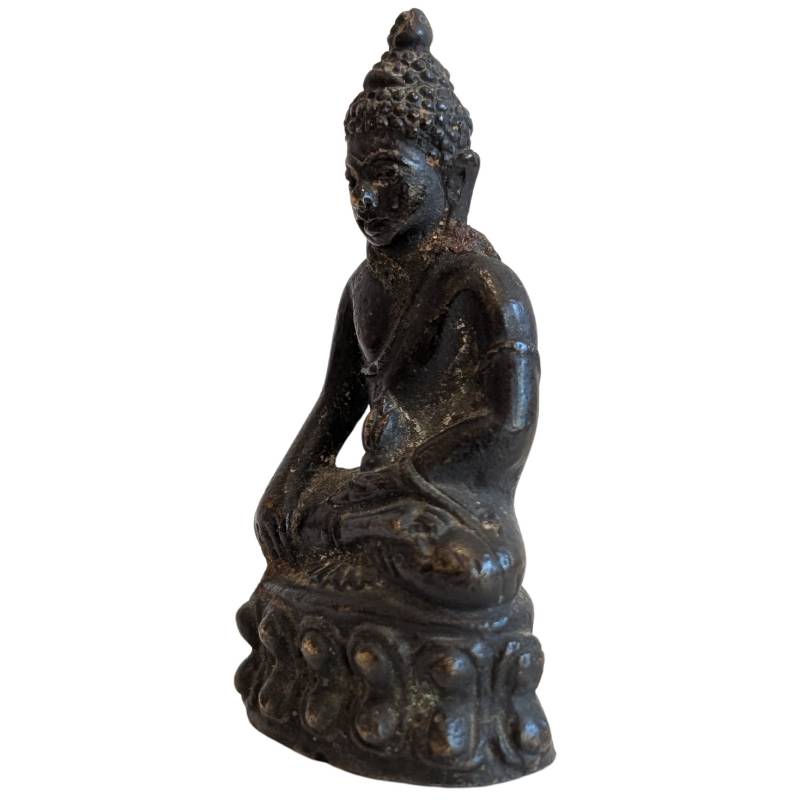 Left-front view of the Thai Buddha in Bhumisparsha Mudra