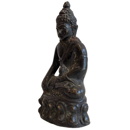 Left-front view of the Thai Buddha in Bhumisparsha Mudra